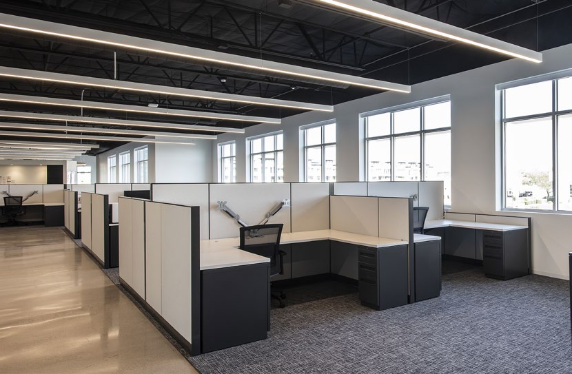 Built-out workstations with mountain and city views